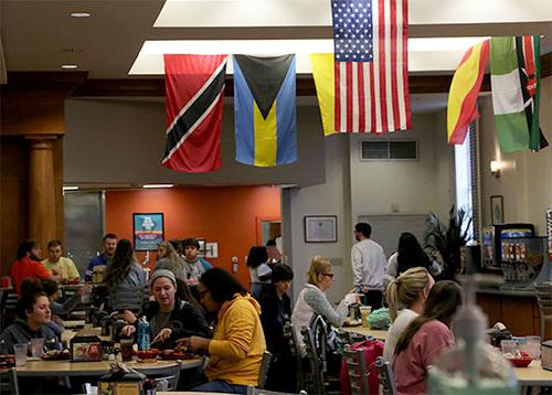 Pitts Dining Hall adorned with flags from around the world