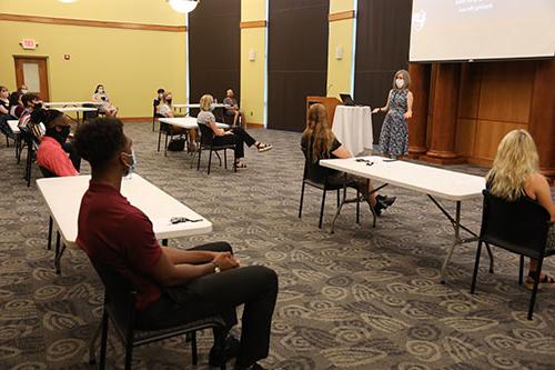 President Baxter addresses a group of students in Dickson Assembly Room