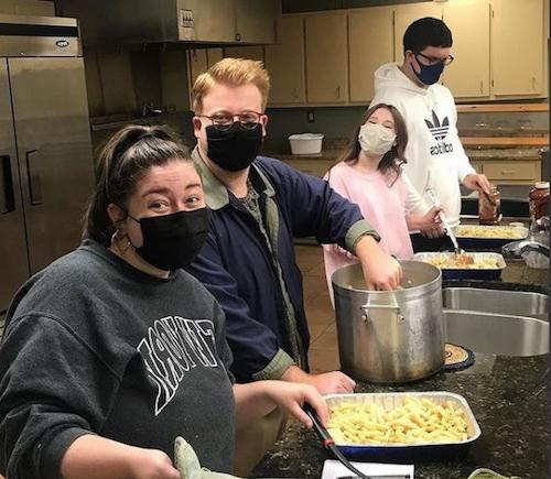 Servant Scholars work at Our Daily Break, their soup kitchen