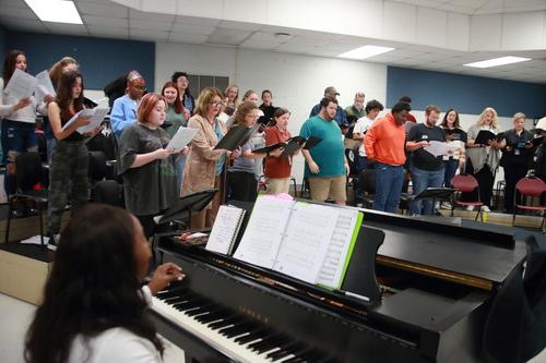 Students join faculty and staff for musical event